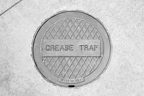 neglecting regular grease trap pumping can lead to foul odors, clogs, and health code violations
